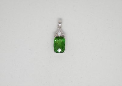 Rounded Emerald Cut Pendant with Cubic Zirconia trim.